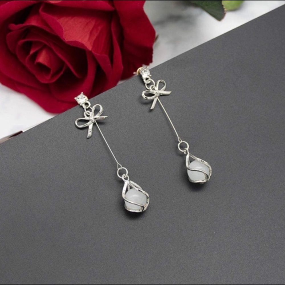 White opal colored drop post earrings